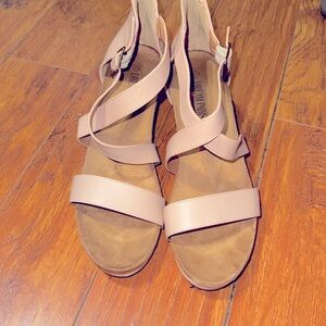 Woman’s off pink wedge sandals